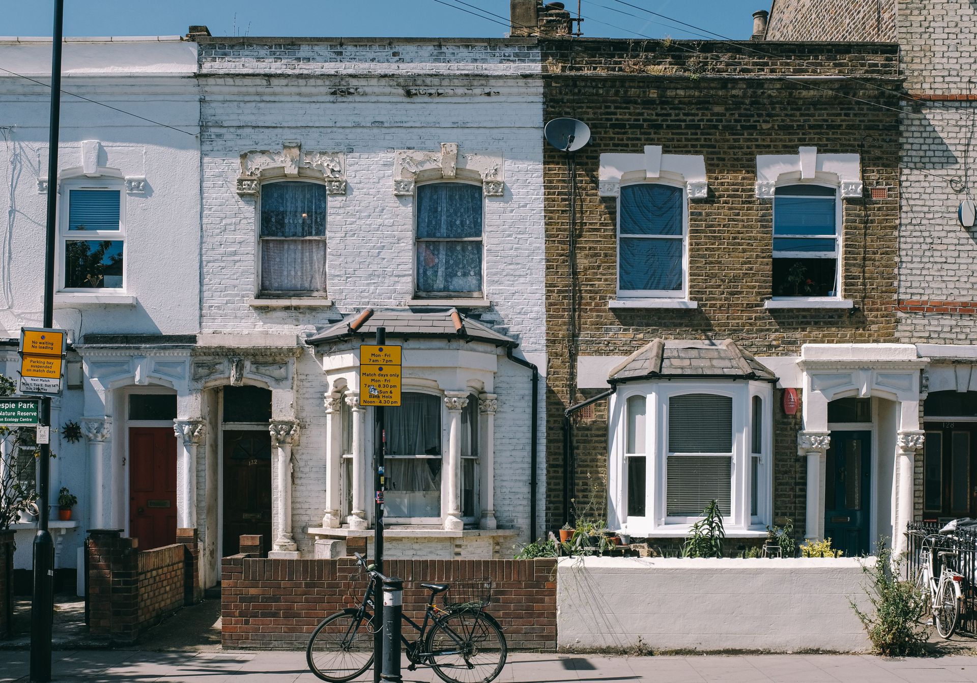 Row of traditional brick terraced houses